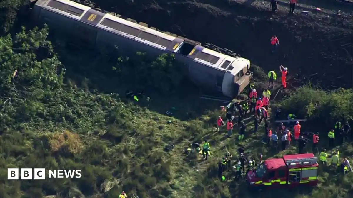 Aerial footage shows derailed train