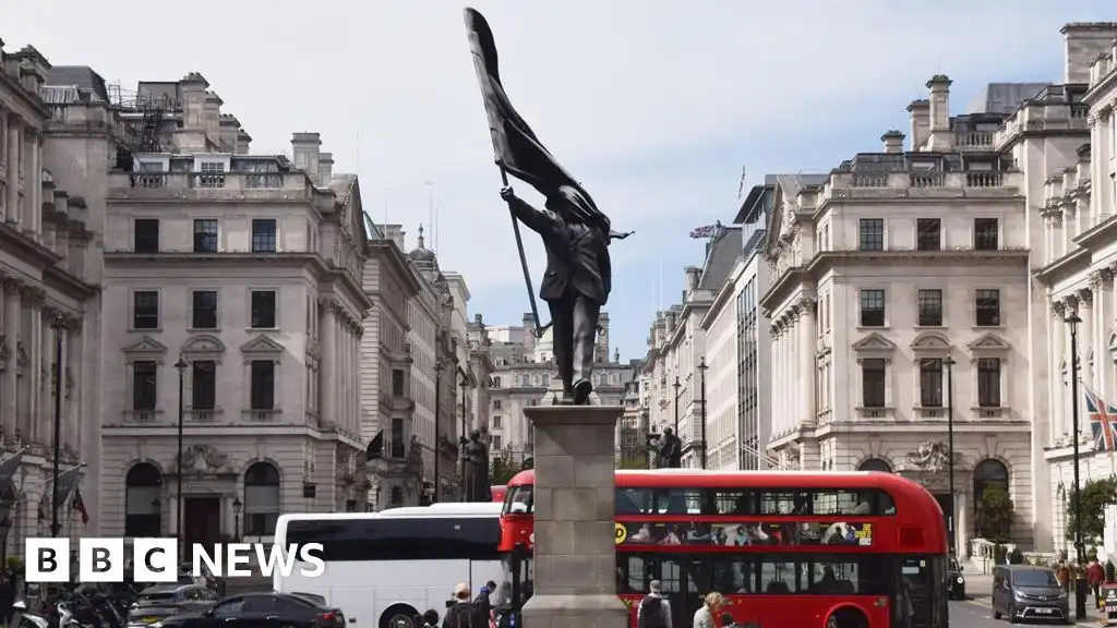 Banksy's signature appears on new statue in central London