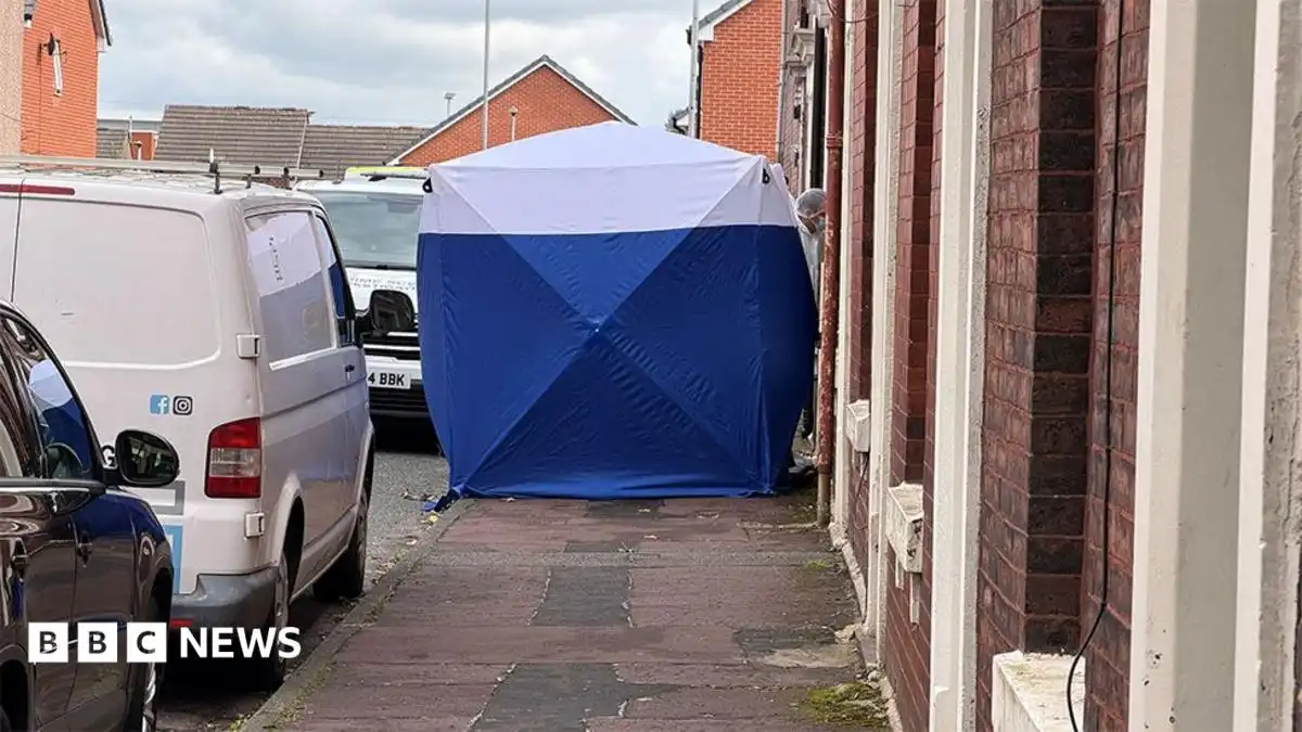Blackburn murder arrest after two people found dead at house