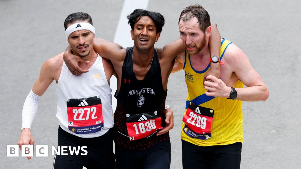 Boston marathon: NI runner helps competitor after collapse