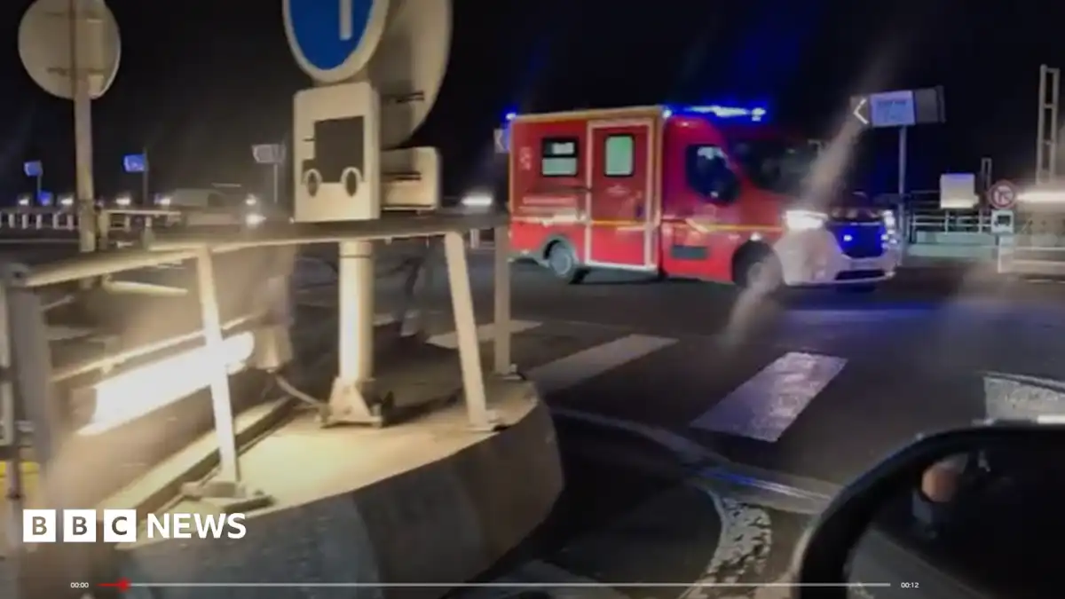 Bus hits train stopped on French side of  Channel Tunnel, with 19 injured