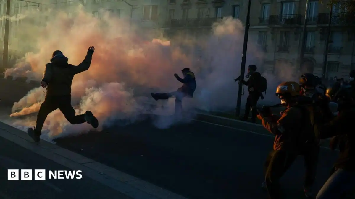 Clashes erupt between police and protesters in Paris