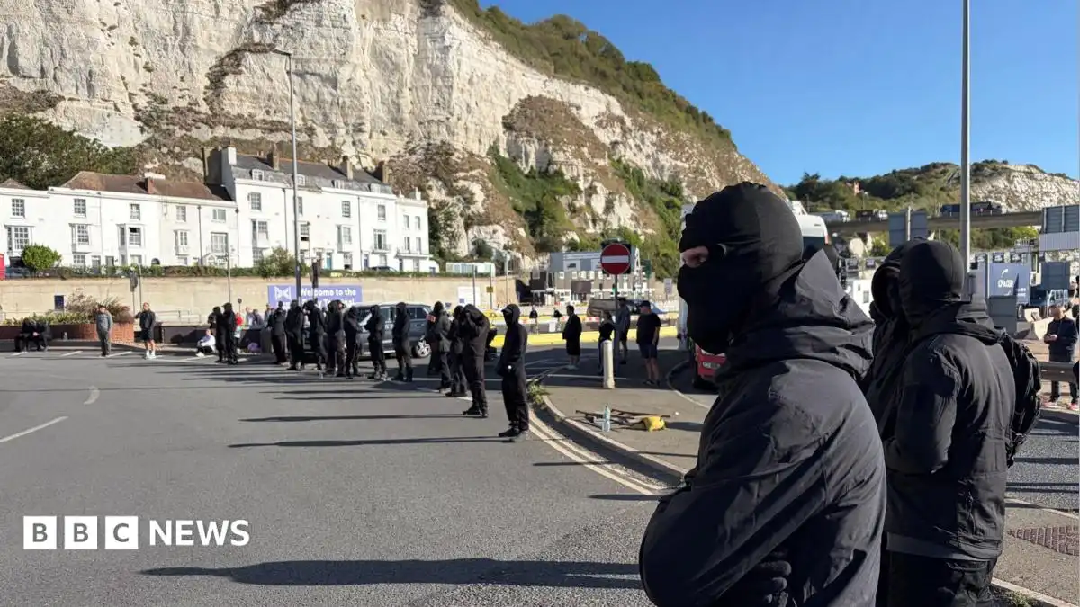 Disruption at Port of Dover as masked men hold protest