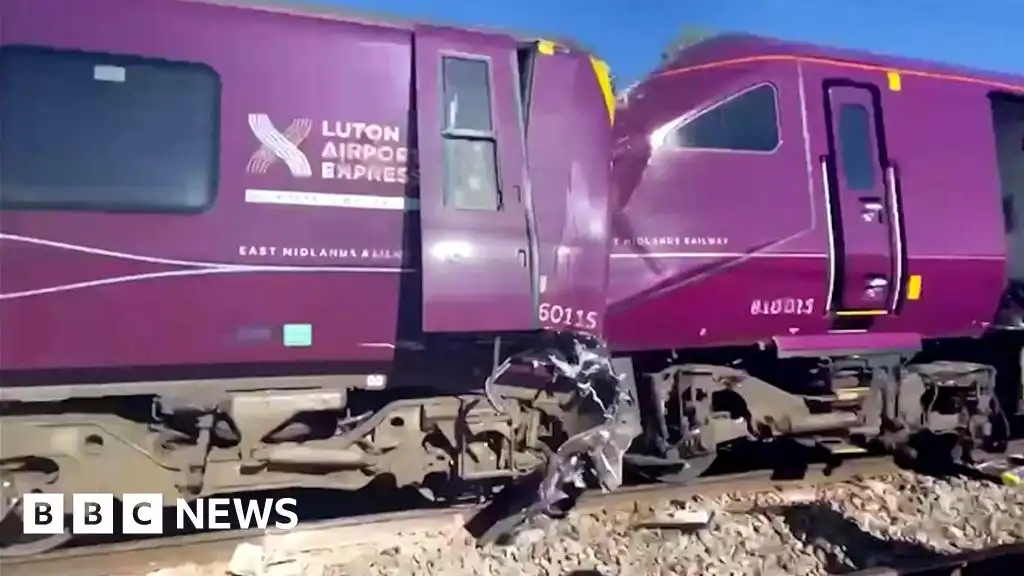 Driver dies and 33 passengers seriously injured in Bedford train collision