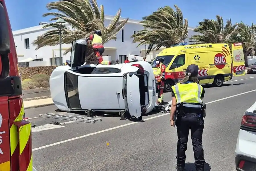 Driver rescued after car flips onto side in Costa Teguise
