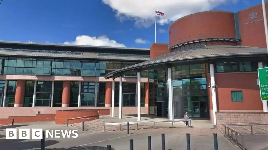 Ex-teacher sexually abused and smothered baby he adopted, jury told