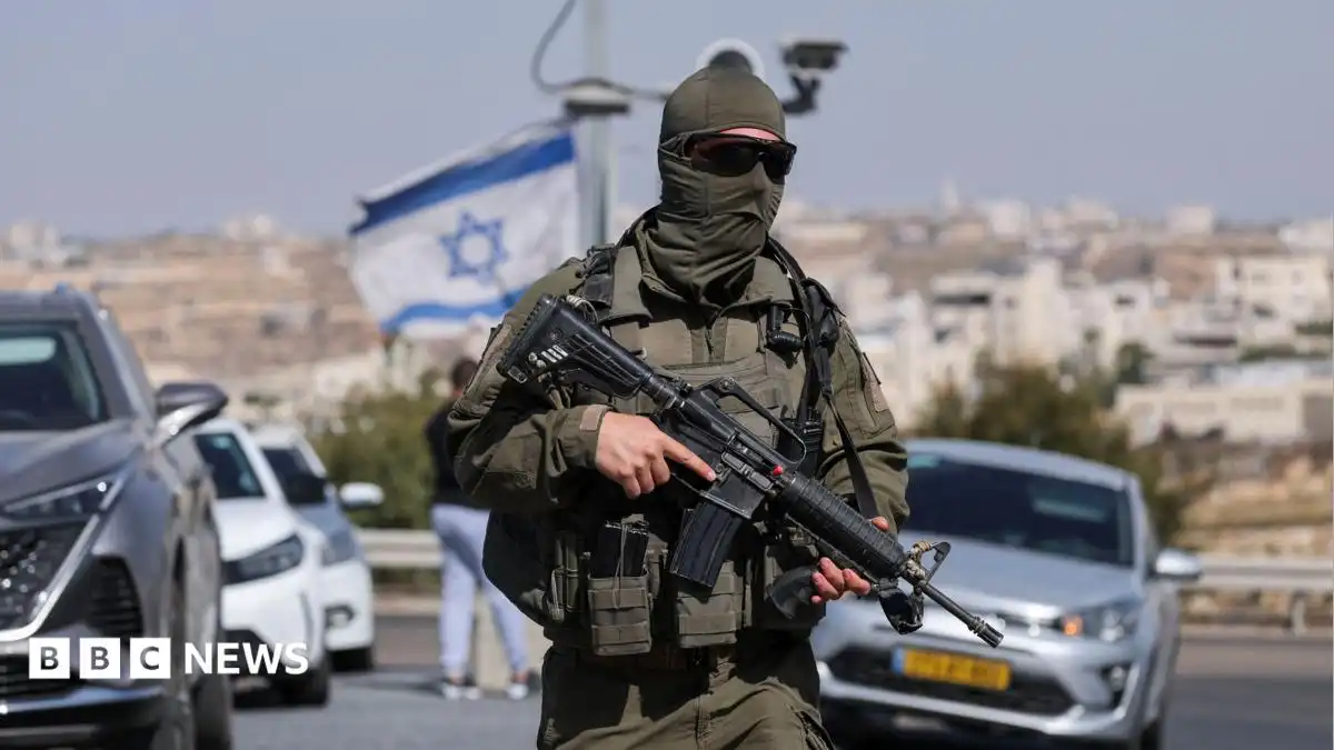 Five Israelis wounded and two suspected Palestinian attackers killed in West Bank shooting