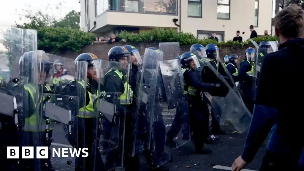 Further six men charged over violent disorder after Nowak protest