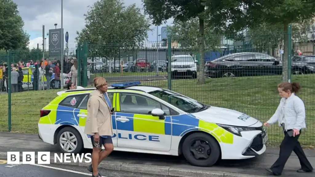 Girl, 14, charged with attempted murder after Manchester school knife attack