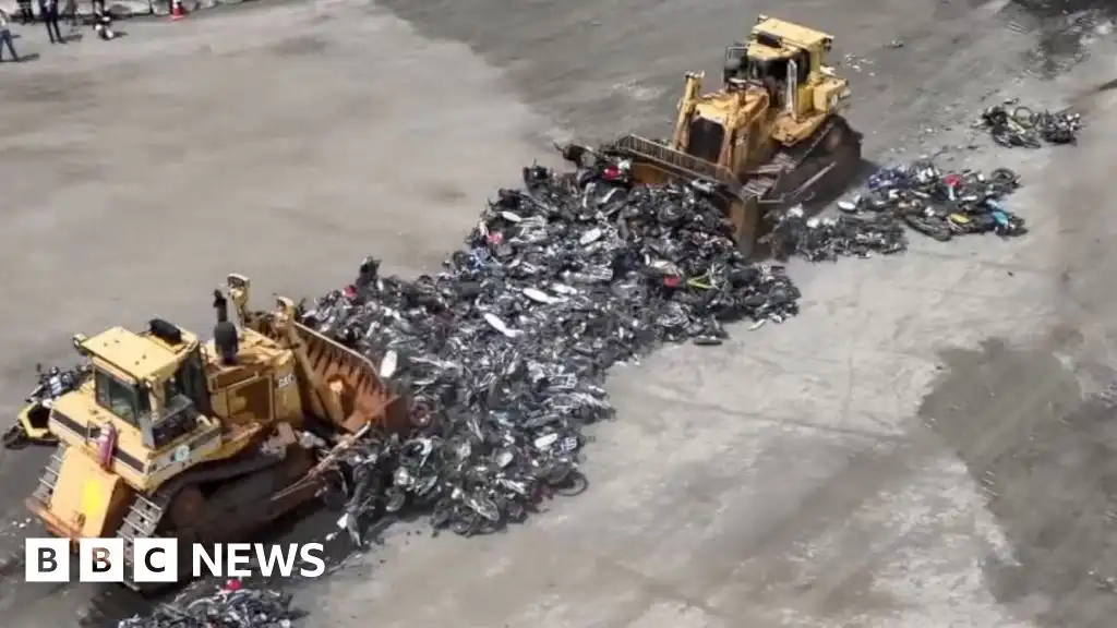 Hundreds of illegal motorbikes bulldozed in NYC crime crackdown