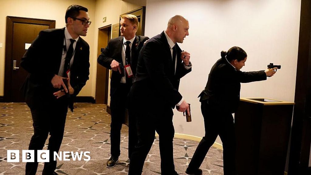 In pictures: Chaos as gunfire heard in Washington ballroom
