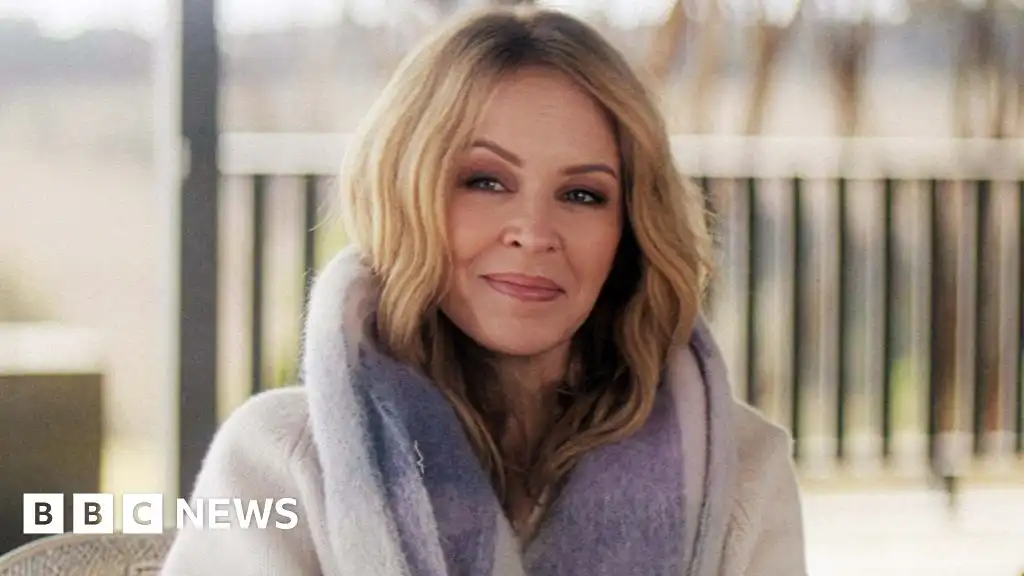 Kylie Minogue reveals she had second cancer diagnosis in 2021