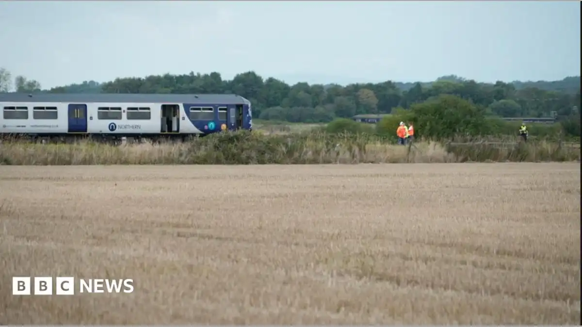 Man dies in Burscough after train hits van on crossing
