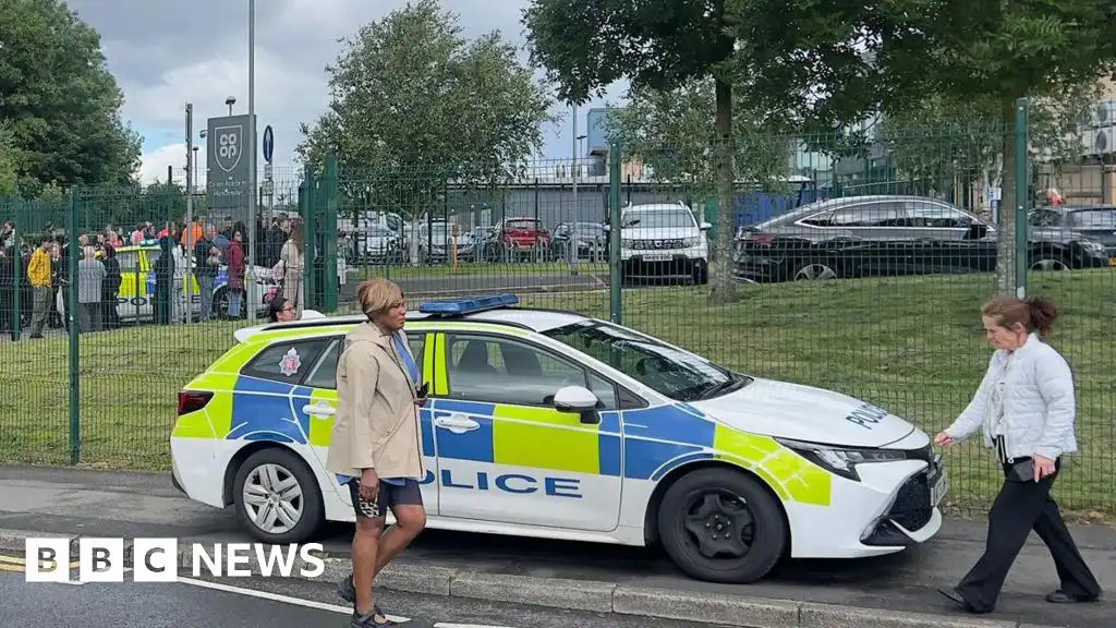 Manchester schoolgirl arrested after three hurt in knife attack