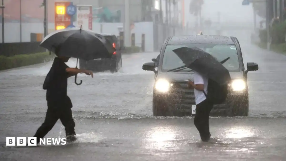Millions urged to evacuate as Typhoon Dujuan hits Japan