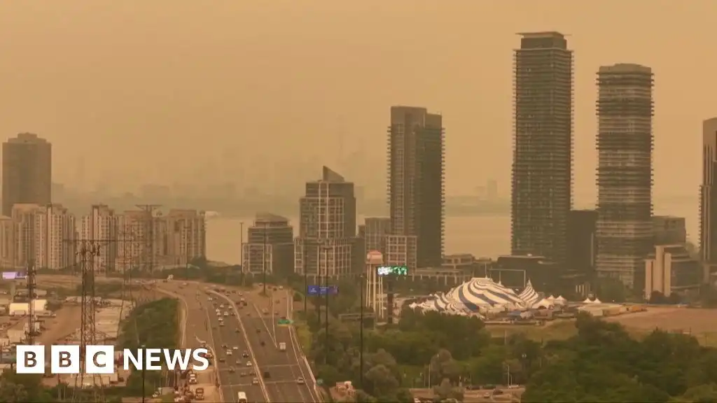 Orange haze from Canada wildfires seen in Ontario and northern US