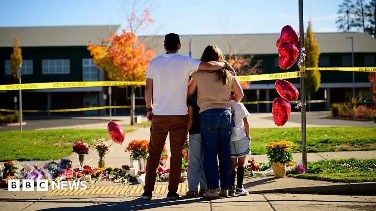 Oregon teacher fought school attacker before armed dad killed suspect