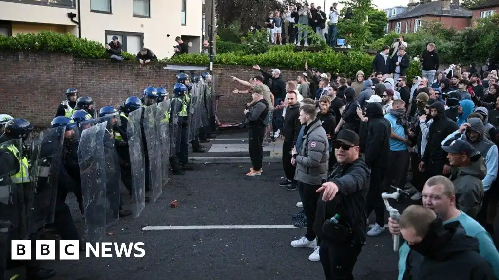 Police pelted with missiles at Henry Nowak protest
