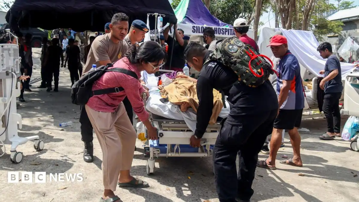 Rescuers search for survivors of powerful Indonesia earthquake