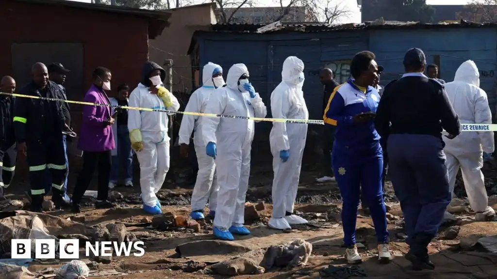 South Africa mass shooting: 12 killed in Johannesburg as manhunt under way