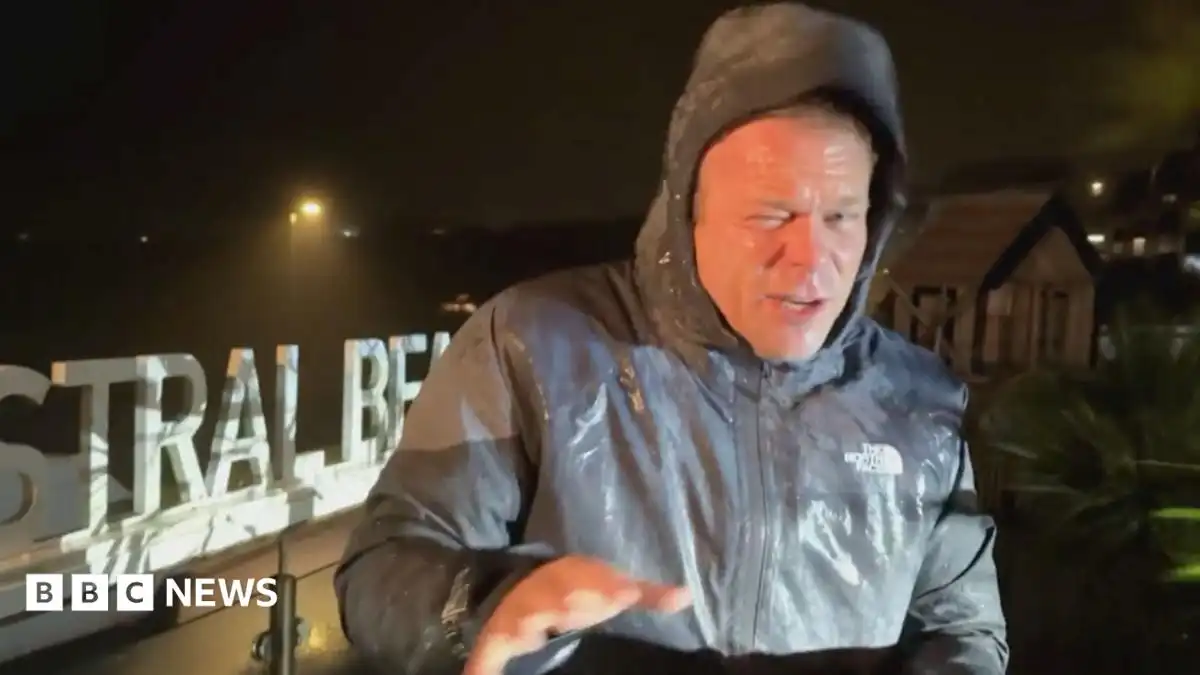 Storm Austen: BBC presenter battles strong winds as storm hits Cornwall