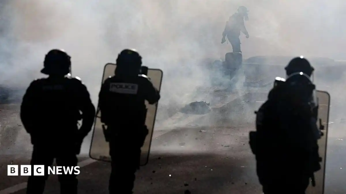 Teenager's hand blown off during confrontation between France school protesters and riot police
