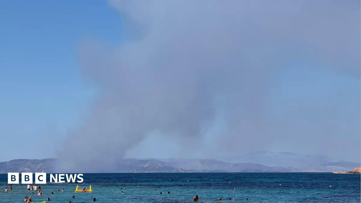 Two dead and hundreds evacuated as wildfires break out near Athens