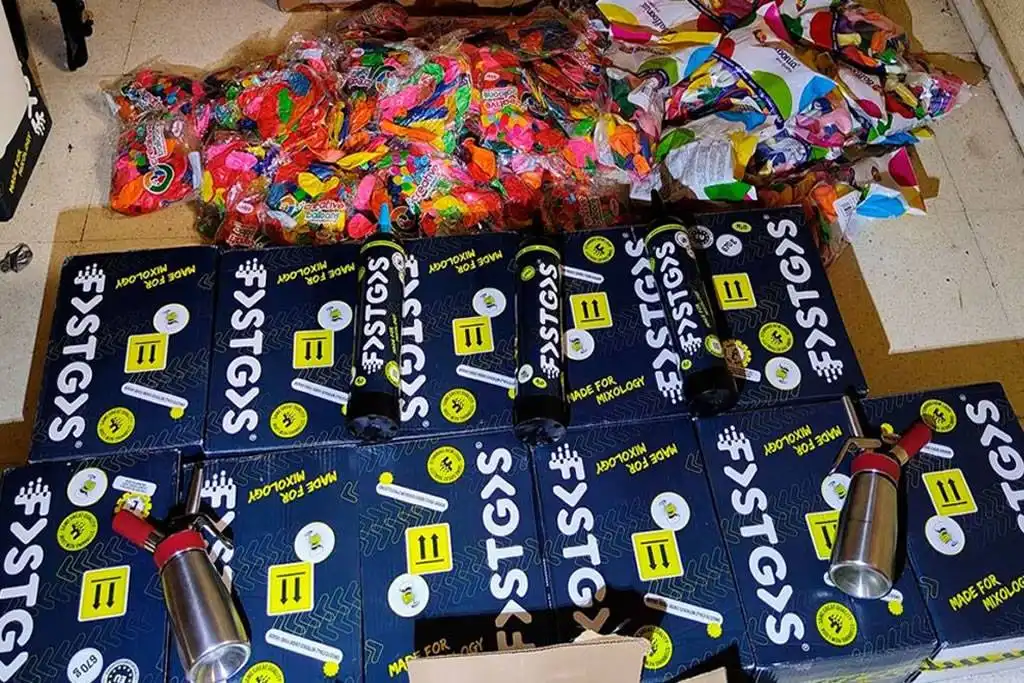 Two staff arrested at a well-known bar in Veronicas as police seize large stash of laughing gas