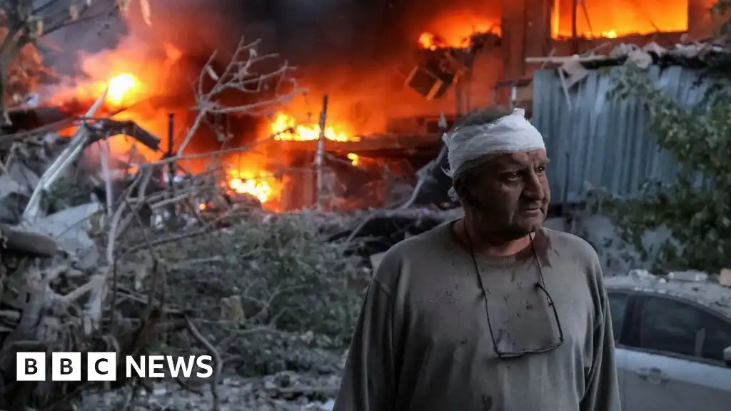 Ukraine rescuers pull dead from rubble after Russian strikes kill 18