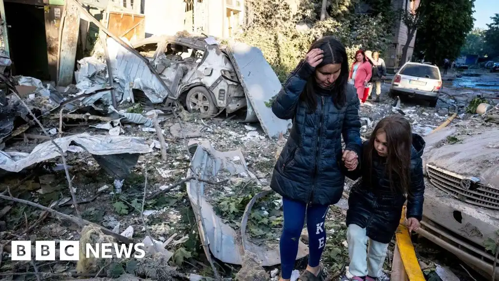 Ukraine rescuers pull dead from rubble after Russian strikes kill 22