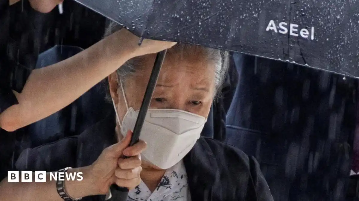 Unification Church: 'Moonies' church leader jailed for two years over bribery offences