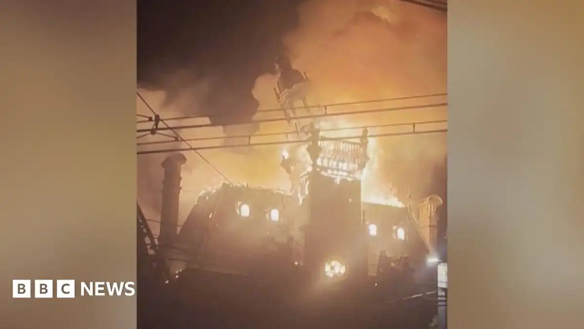 Watch: Moment historic French town hall spire collapses in flames amid protests