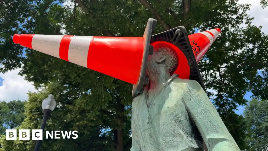 Why are Scotland fans putting traffic cones on Boston's statues?
