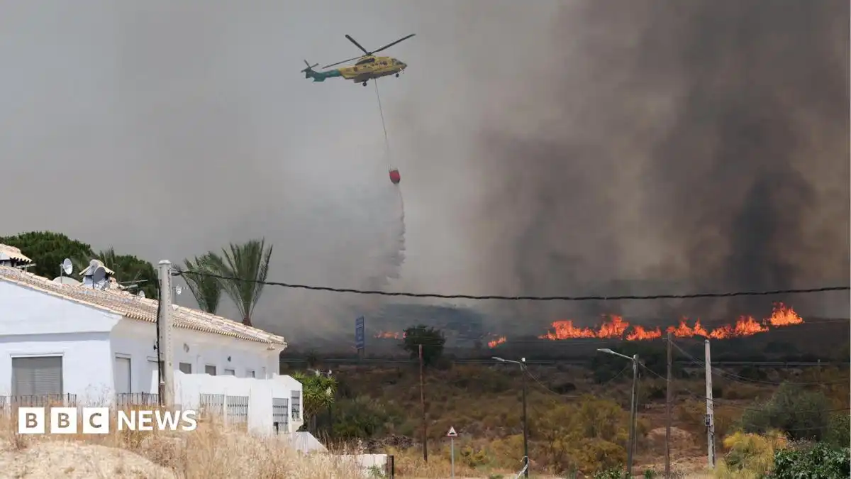 Wildfire in southern Spain leaves at least 12 dead and 23 missing